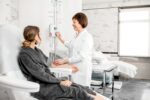 Female patient receiving dialysis treatment